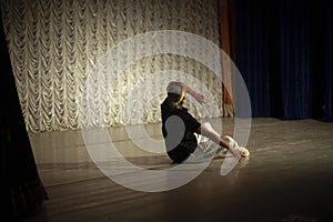 Dancer on stage. Ballet teacher. Expression of emotions in motion. Choreography lesson