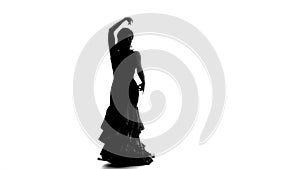 Dancer turns in an incendiary dance. White background. Silhouette