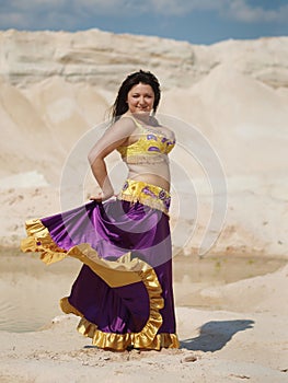Dancer in violaceous skirt