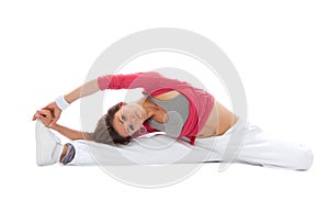 Dancer woman sit on twine and stretching