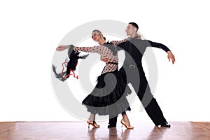 Dancers in ballroom against white background