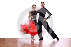 Dancers in ballroom against white background