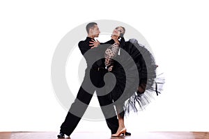 Dancers in ballroom against white background