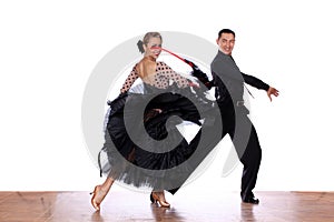 Dancers in ballroom against white background