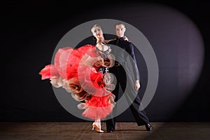Dancers in ballroom isolated on black background