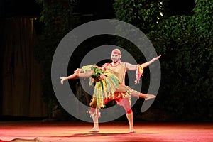 Dancing couple from Colombian Barrio Ballet stage prformance