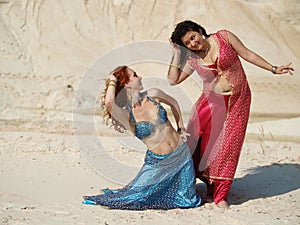 Dancers in different dresses