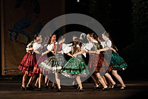 Slovakian girls performing traditional dance in circle