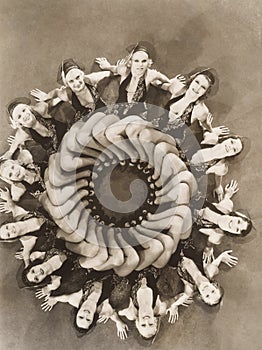 Dancers forming a circle with their legs