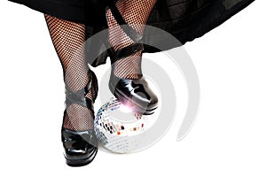 Dancers legs with disco ball