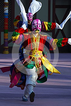 Dancers with pink masks