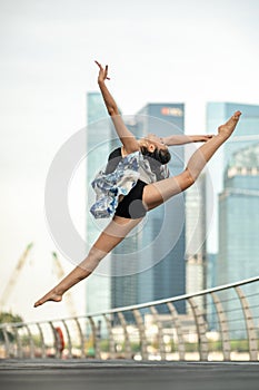 Dancing on the air... Beautiful Young Dancer posing, perfoming