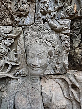 Dancing Apsara Girl Carved On The Wall Of Temple In Cambodi.