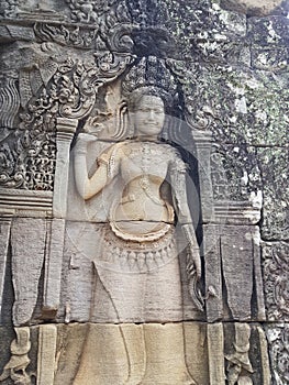 Dancing Apsara Girl Carved On The Wall Of Temple In Cambodi.