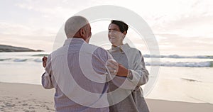 Dancing, beach and senior couple outdoor at sunset for love, care and quality time on travel. Happy man and woman