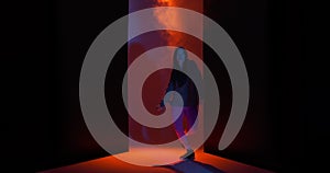 Dancing cool girl performing freestyle dance in red studio light with smoke. Modern lifestyle, breakdancing, hiphop
