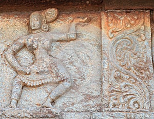 Dancing girl and beautiful design Carved in the stone, on the wall of Mahanavami dibba, Hampi , INDIA