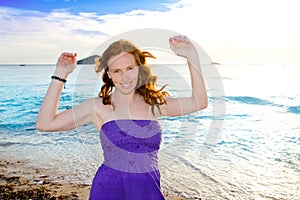 Dancing girl at Ibiza sunset in Cala Conta photo