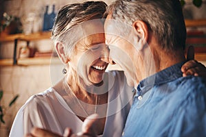 Dancing, happy senior couple smile together and dance with love in retirement. Anniversary celebration at home, mature