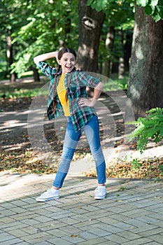 Dancing hiphop.Happy adolescent girl dancer dancing outdoors, dancing