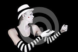 Dancing mime in white hat