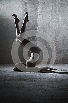 Dancing modern dancer pose on the floor.