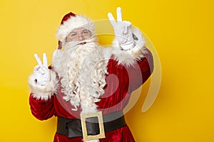 Dancing Santa showing peace sign