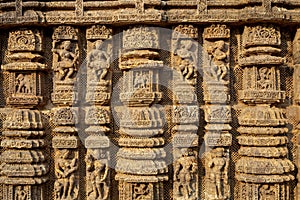 Dancing Sculpture postures with musicians on the walls of Sun Temple, Konark