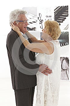Dancing senior couple