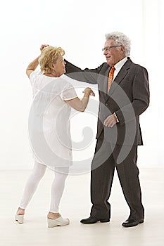 Dancing senior couple