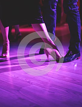 Dancing shoes of a couple, couples dancing traditional latin argentinian dance milonga in the ballroom, tango salsa bachata