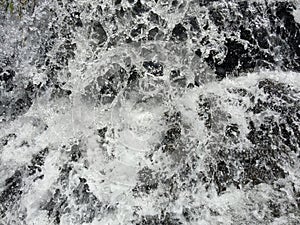 Dancing sparkling white flowing water