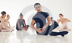 Dancing is surely the most basic and relevant. a group of young male ballerinas preparing for their routine.