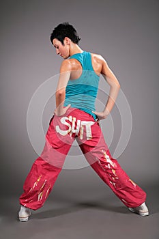 Dancing woman in sportswear behind