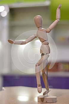 Dancing wooden doll.