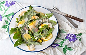 Dandelion leaves meal salad on a plate