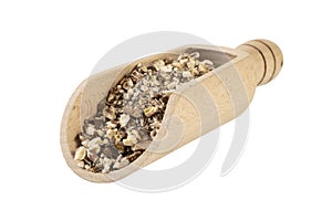 dandelion root or in latin Taraxaci radix in wooden scoop isolated on white background. medicinal healing herbs