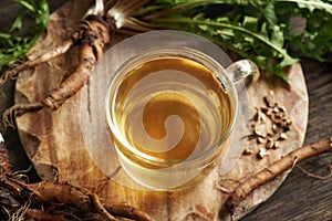 Dandelion root tea in a glass cup