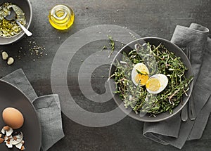 Dandelion salad with eggs and dressing