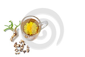 Dandelion tea background, herbal remedy. Dandelion tea, flower, leaves and root on wooden background.