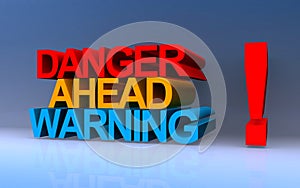 danger ahead warning on blue