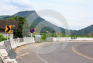 Danger curve road sign