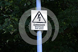 Danger of death overhead live cables electricity can kill