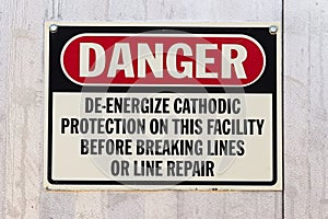 A Danger Deenergize Cathodic Protection at this Facility sign