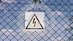 Danger of electric shock. electrical substation. Distribution and transmission of electricity. High voltage danger to