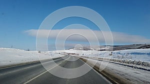 Danger and fast turn at the icy snow road. Motion blur visualizies the speed and dynamics