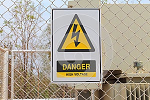 Danger High Voltage sign on a fence