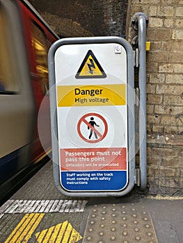 Danger high voltage sign at a train station