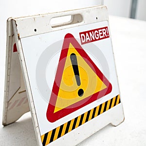 Danger icon isolated on white background photo