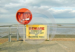 Danger incoming tides sign